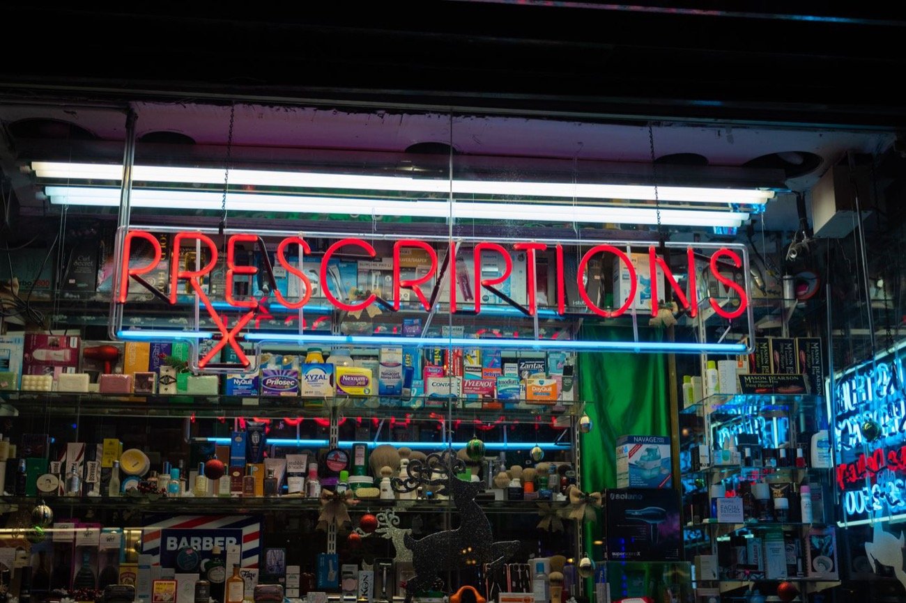 Prescriptions sign on a drug store front