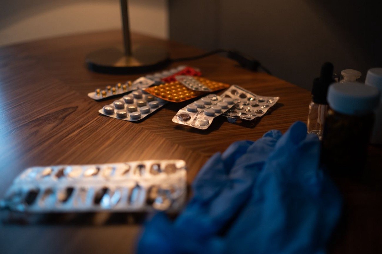 Pill bottles and medication on a table