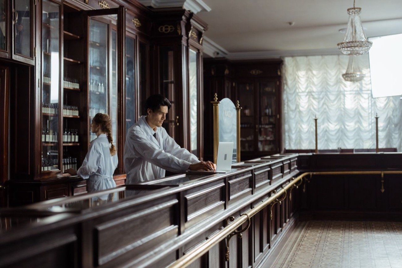 Pharmacist checking product information